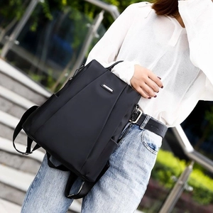 Waterproof black nylon backpack for women with metal logo for daily urban commuting