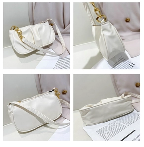 Detailed four-way view of a cream pleated baguette bag with a stylish gold chain strap
