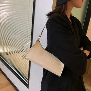 Elegant off-white croco-effect underarm baguette bag with slim shoulder strap for women