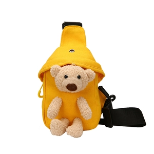 Bright yellow canvas crossbody bag featuring a cute plush teddy bear doll and hoodie hood design