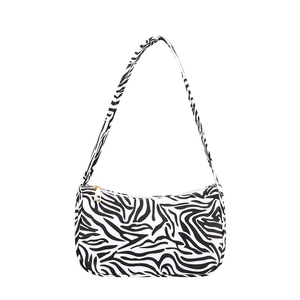 Fashionable zebra print canvas shoulder bag with golden zipper and modern rectangular shape