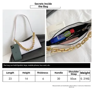 Detailed size guide and interior capacity for the white crocodile pattern shoulder bag