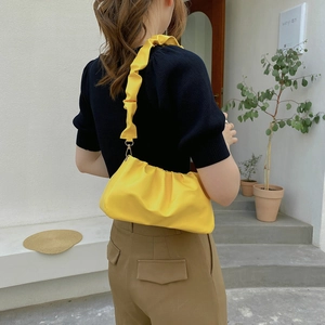 Minimalist yellow pleated cloud bag for women with wide shoulder strap in casual style