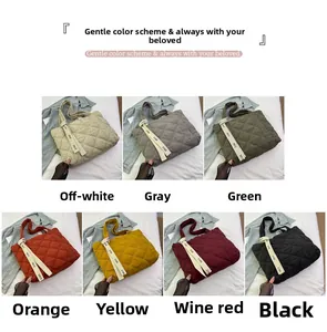 Quilted tote bags shown in seven colors including beige grey green orange yellow burgundy and black