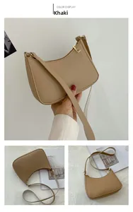 Detailed views of khaki leather crescent underarm bag with gold zipper and slim strap