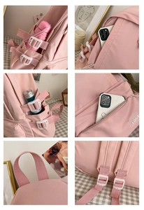 Detailed view of pink school backpack pockets and reinforced strap for high capacity