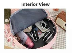 Interior view of the pink backpack showing spacious capacity for tablets and daily items
