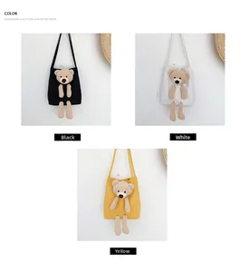 Drei-Farben-Display der Bären-Stofftaschen in Schwarz, Weiß und Gelb Optionen