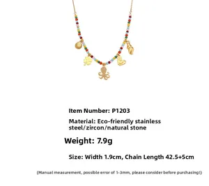 Detail of octopus pendant with zircon and colorful natural stone beads on a gold chain