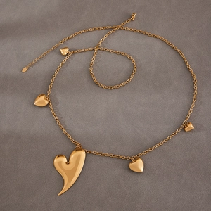 Collier double épaisseur en acier inoxydable doré 18 carats avec pendentifs en cœur