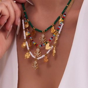 Three-layer ocean-style necklace with crystal beads and octopus shell gold pendants