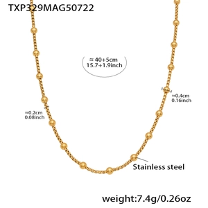 Détail du collier à billes en acier inoxydable doré avec spécifications de taille