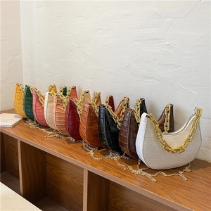 Fashionable crocodile pattern crescent shoulder bags with thick gold chain straps in multiple colors
