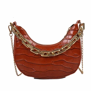 Chic caramel crocodile pattern crescent shoulder bag with bold gold chain accessory