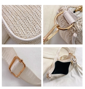 Detailed close-up of woven straw tote bag featuring gold hardware and PU leather trim