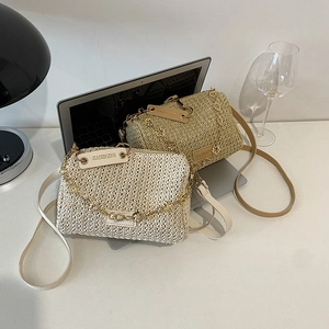 Woven shoulder bag with gold chain and brand tag in off-white and khaki colors