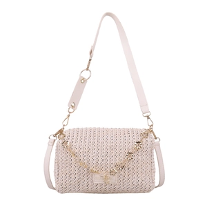 Cream woven crossbody bag with gold floral chain strap and rectangular logo patch