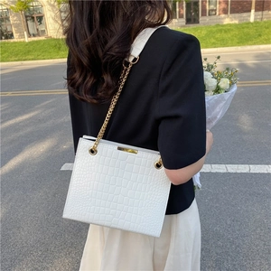 White faux crocodile skin tote bag with gold chain strap for women professional daily wear