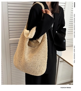 Detail of hand-woven crochet tote bag with inner lining and hollow texture pattern