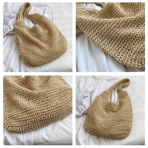 Detail shot of the beige woven tote bag showing intricate crochet texture and handle