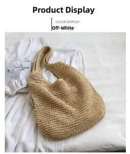 Close-up of cream white hand-woven tote bag showing detailed rope knit texture and pattern