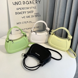 Minimalist half-moon PU leather handbags with knotted handles in four assorted colors