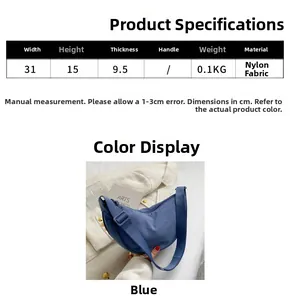 Size chart showing dimensions 31x15x9.5cm for the blue nylon crossbody crescent bag
