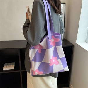 Knitted checkerboard tote bag with purple floral pattern and shoulder straps