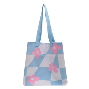 Blue and white checkered knitted tote bag with pink flower patterns and dual handles