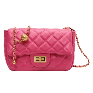 Fuchsia quilted leather crossbody bag with golden chain strap and ball adjustment buckle