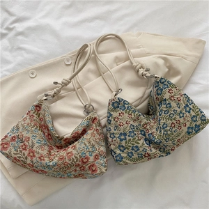 Floral jacquard tote bag with vintage pattern and stylish knotted leather shoulder strap