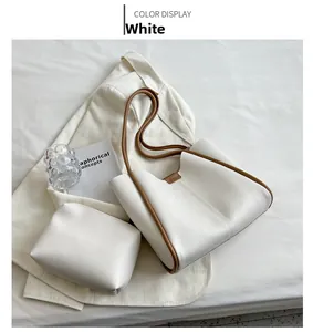 Detailed top view of white large capacity tote bag set with contrasting brown trim details