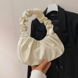 Creamy white ruched cloud bag with pleated handle and soft PU leather half-moon design
