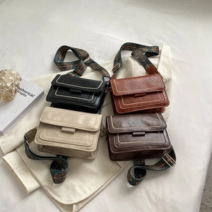 Retro square crossbody bags in black and brown with wide ethnic style straps