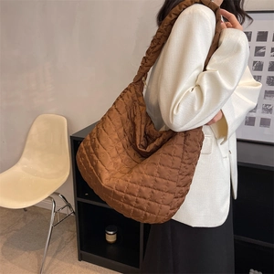 Quilted nylon tote bag in brown with diamond patterns and spacious interior
