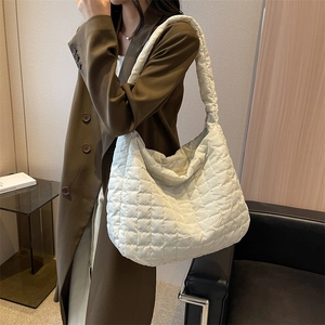 White quilted puffer tote bag in large size with padded shoulder strap for women