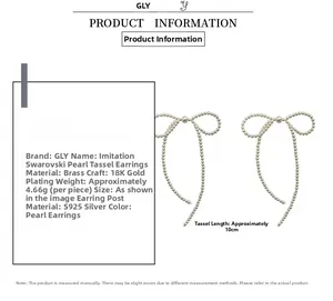 Macro detail of 10cm long tassel chain and pearl bow on 18K gold plated earring