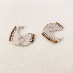 Ethnic crescent moon earrings with tiger eye beads and tribal geometric silver engraving