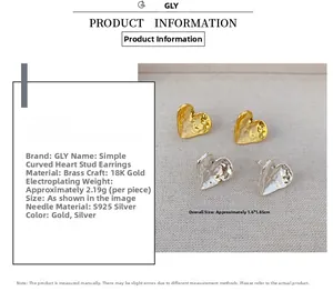 Macro detail of curly heart-shaped earrings with 18K gold plating and S925 silver needles