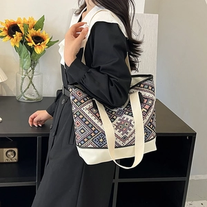 Sac seau en toile tissée de style ethnique avec motifs géométriques et anses en cuir
