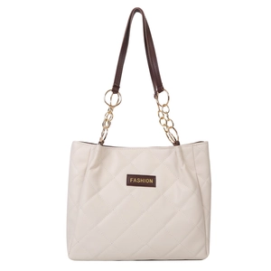 Cream quilted tote bag with brown straps and gold chain accents for daily commute