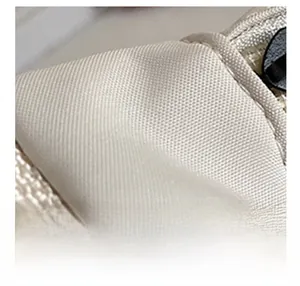 Détails du tissu en nylon beige avec fermeture éclair durable et sangle renforcée