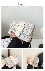 Détail du sac bandoulière en tweed avec chaîne dorée et boucle de fermeture cuir