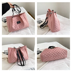 Multiple views of a pink quilted nylon tote bag with black handles and metal chains