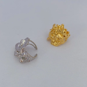 Gold and silver floral cluster rings with intricate vintage design and open adjustable band