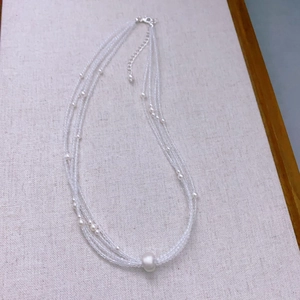 Multi-layer white crystal pearl beaded necklace with brushed abacus bead pendant