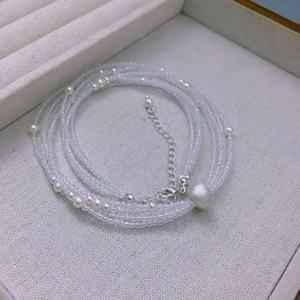 Multi-layer necklace with white irregular pearls and clear faceted crystal beads in a gift box