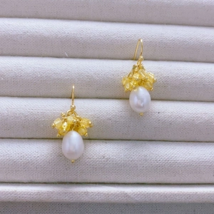 Handmade drop earrings with white pearls and yellow crystal raw stones on gold hooks
