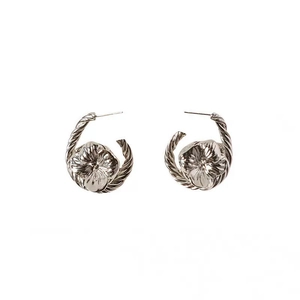 Vintage floral knot hoop earrings in polished silver metal with intricate petal details