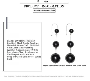 Detail of 7cm long black agate earrings with three gradient beads on 18K gold brass hooks